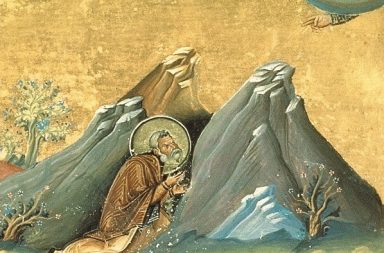 Pintura medieval de un santo ermitaño arrodillado en una cueva rocosa, ilustrando la lucha contra el espíritu del error.